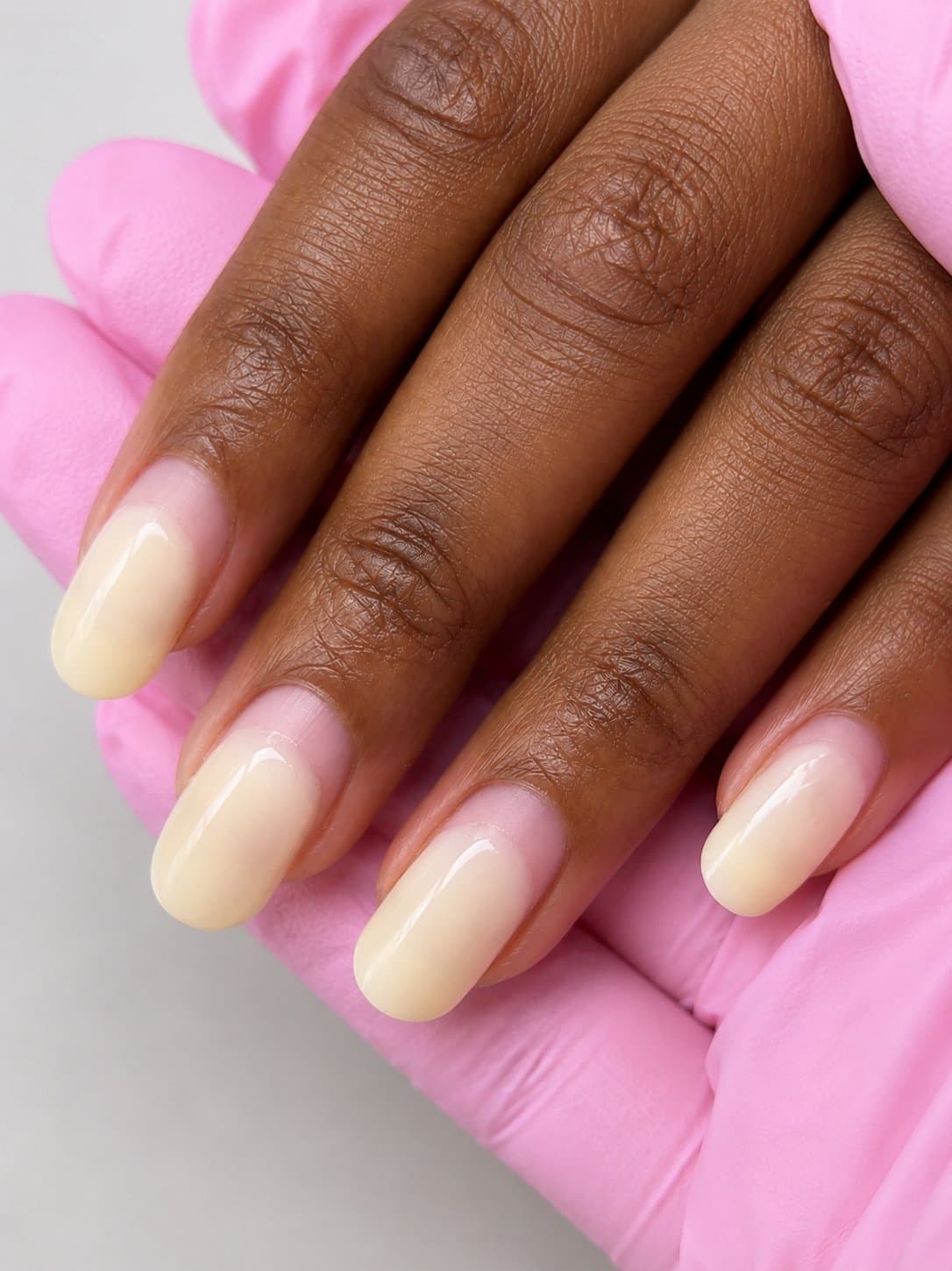 Nails before treatment at Aetheria Beauty Bar.